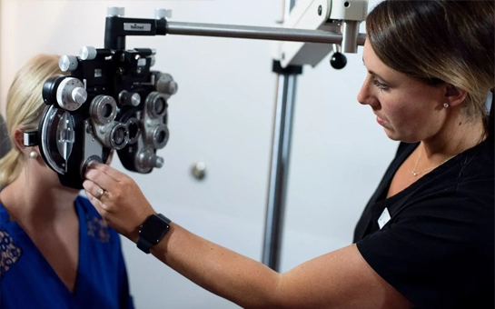 Dr. Josia Leipholtz with a patient during an exam