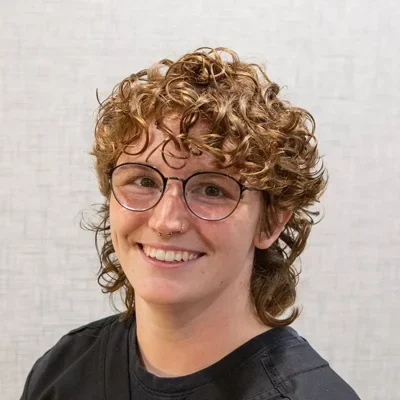 A headshot photo of Annie