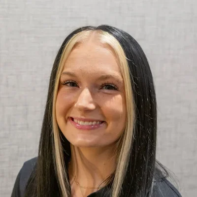A headshot photo of Briana