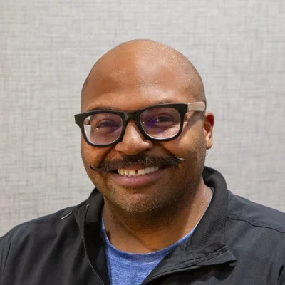 A headshot photo of Jeremy