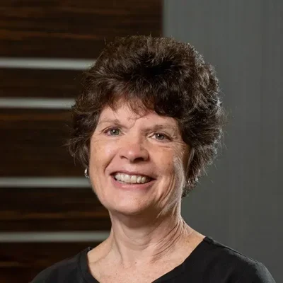 A headshot photo of Kathy