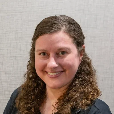 A headshot photo of Kati